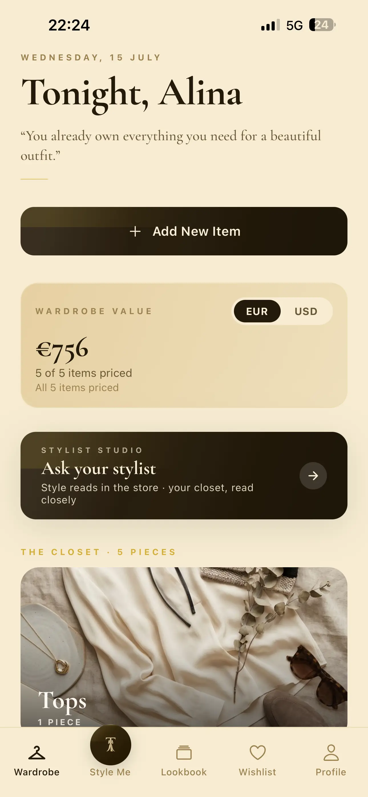 The TYALO home screen: a personal greeting, wardrobe value, and a shortcut to ask your stylist.